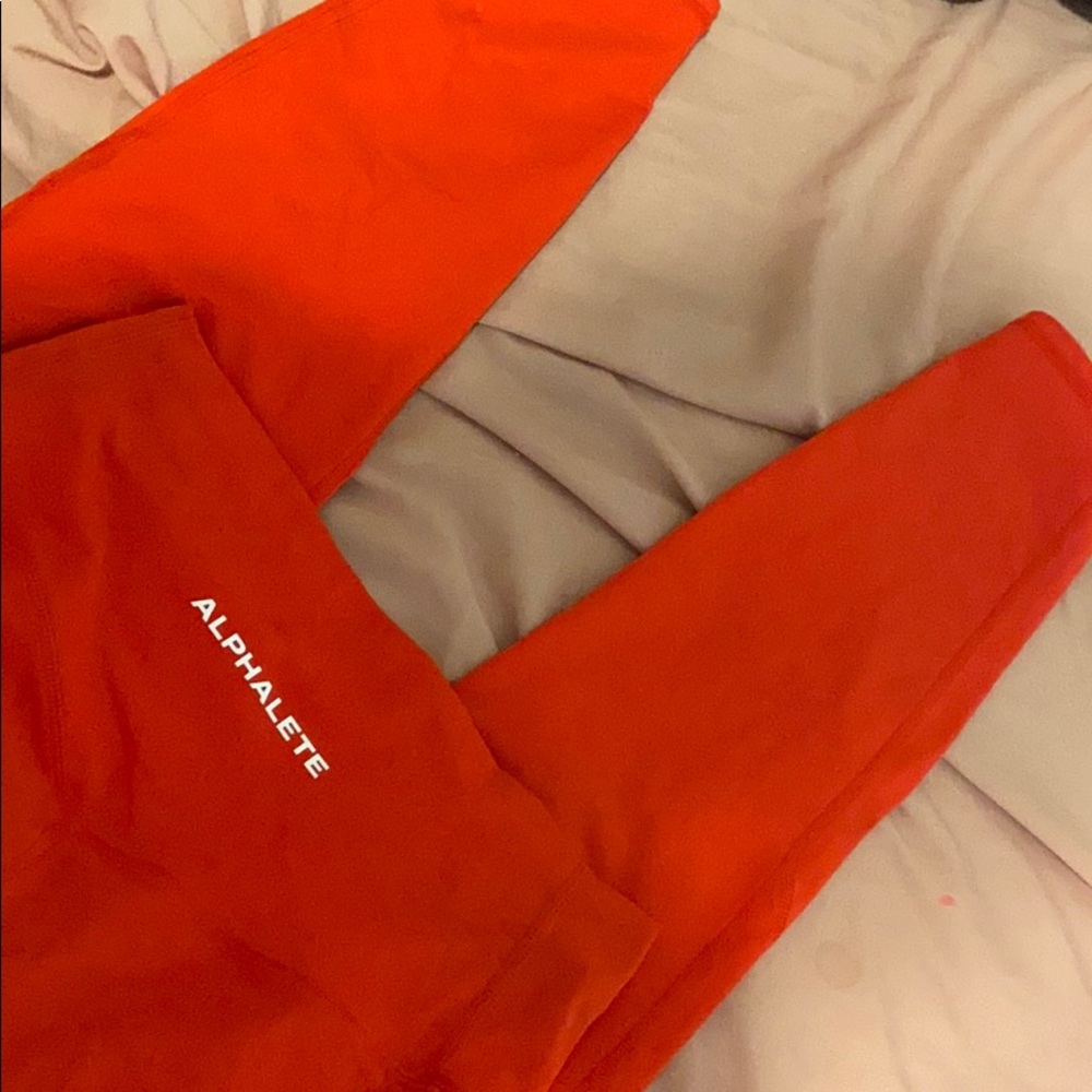 alphalete red leggings pockets